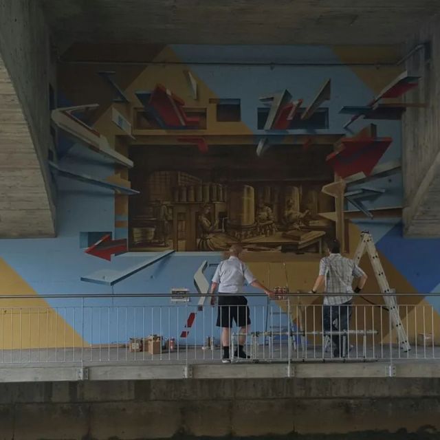 Mitarbeiter vom Malergeschäft Camenzind streichen Wand